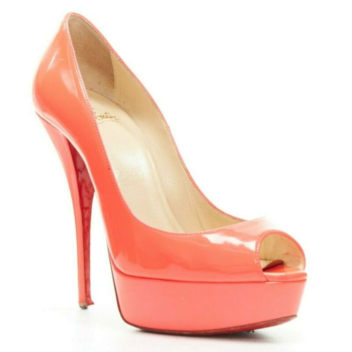 Female mannequin wearing Christian Louboutin Lady Peep 130 Pink Patent Leather Women Heels in Size EU36 | Available at JHROP