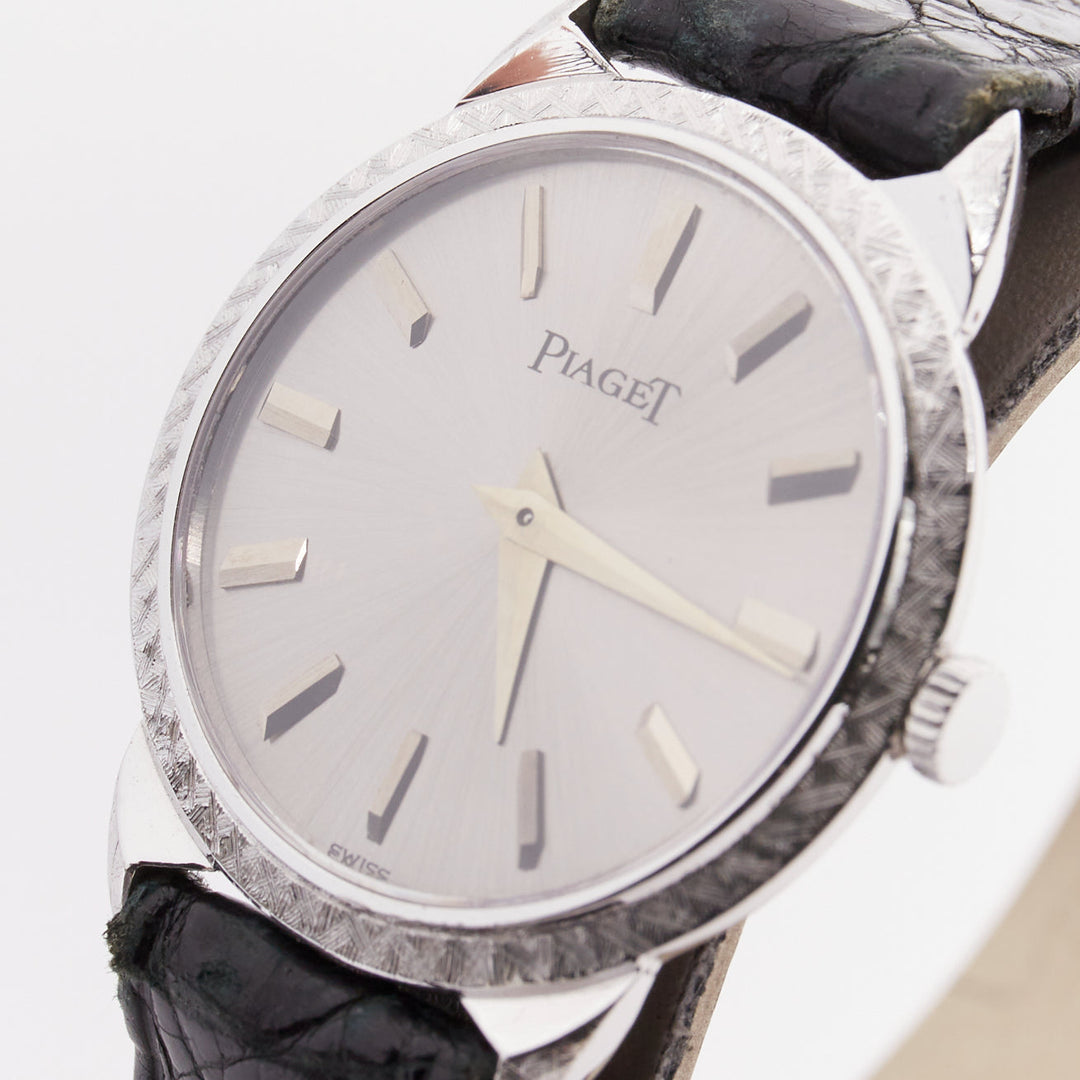 PIAGET Vintage Sunburst Possession silver face black leather logo belted watch