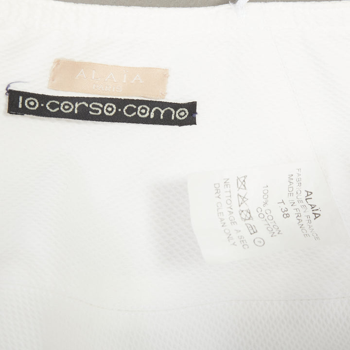 ALAIA 10 CORSO COMO ivory cotton panelled tiered flare knee skirt FR38 M
