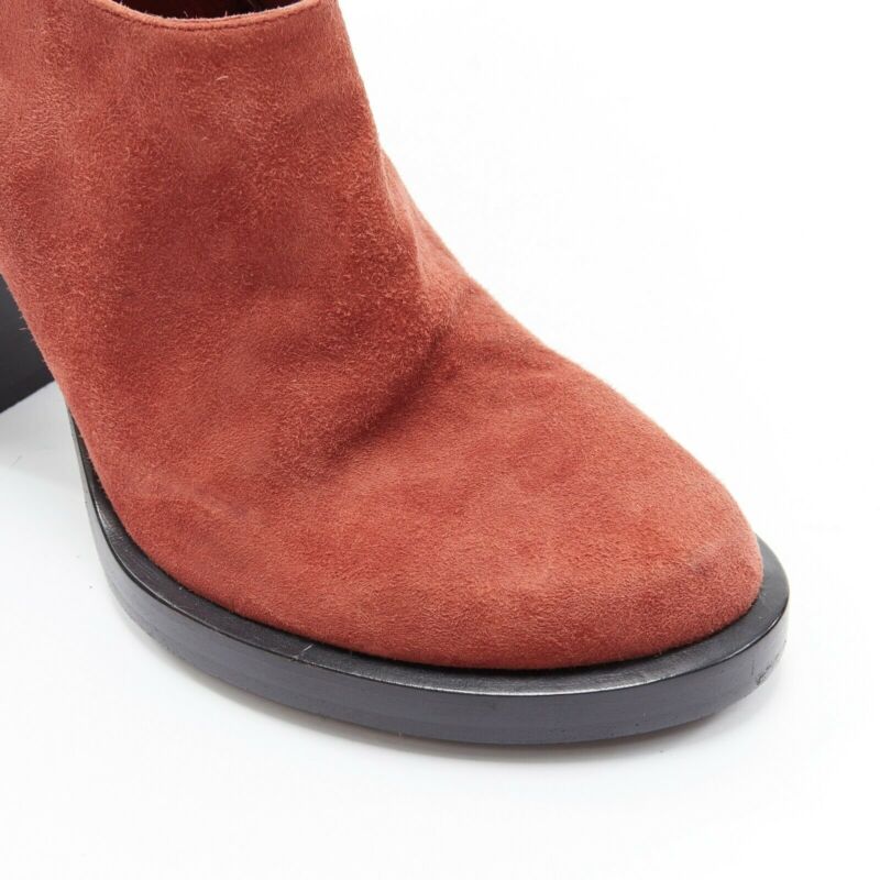 Female mannequin wearing Ann Demeulemeester Red Suede Women Boots in Size EU38 | Available at JHROP