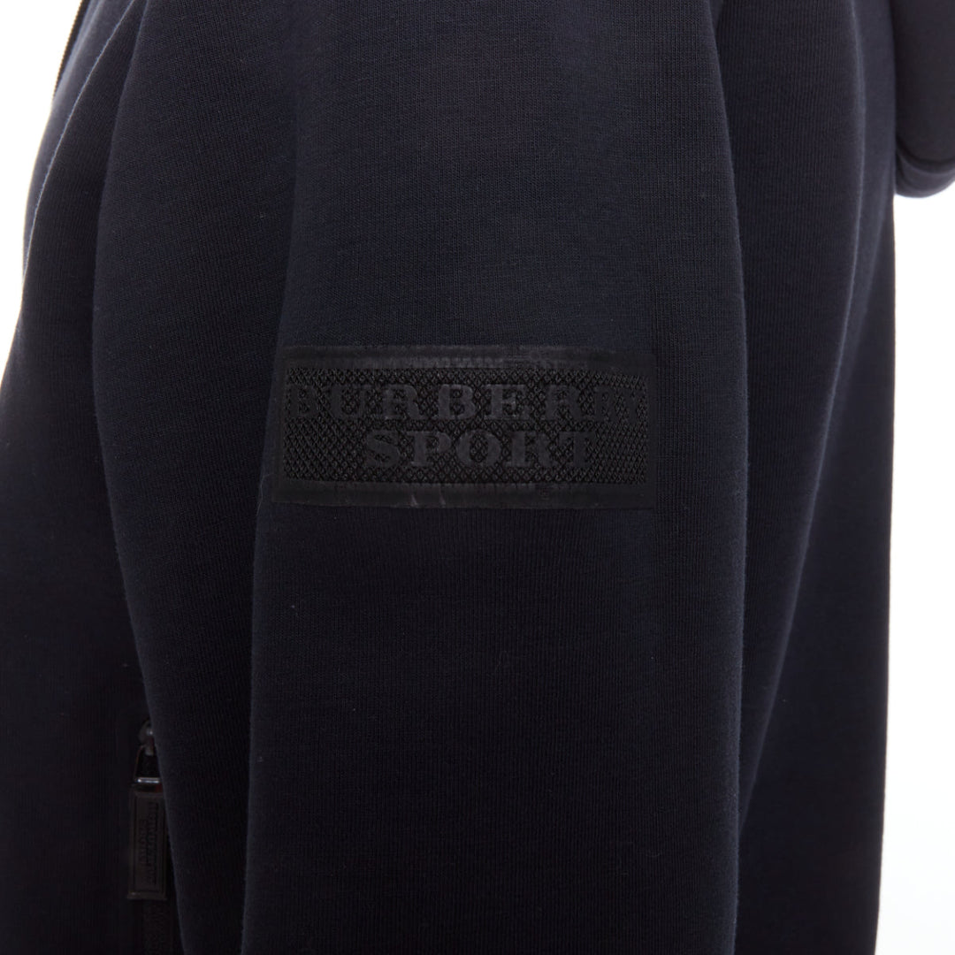 Male mannequin wearing Burberry Sport Black Cotton Men Hoodies in Size  L | Available at JHROP