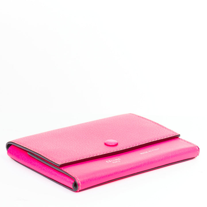 CELINE hot pink grained leather silver logo 4 fold flap wallet