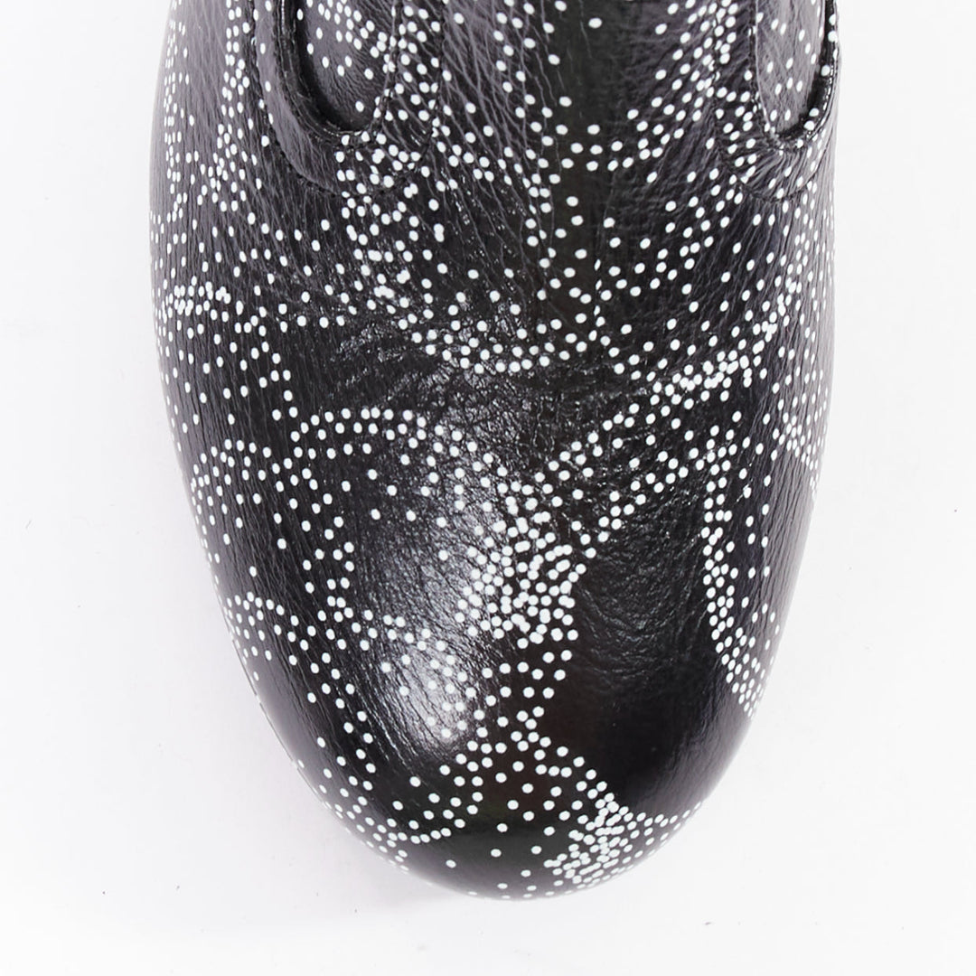 CHANEL 23A Runway white black CC camellia dotted logo print tall boots EU39