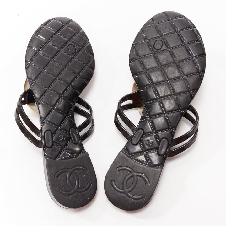 CHANEL cream rubber CC logo camellia black rubber thong slippers EU36
