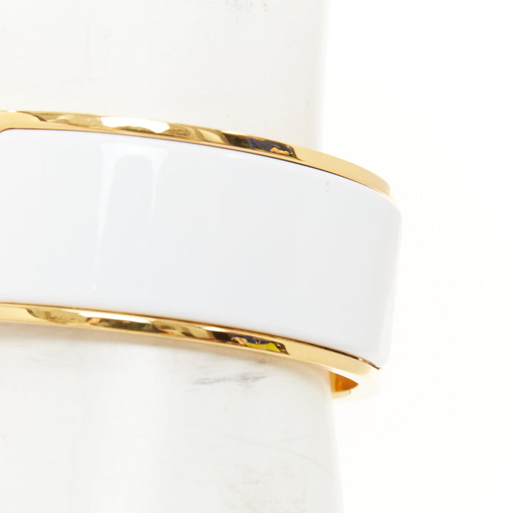 HERMES Clic H white enamel signature logo gold plated narrow cuff bracelet