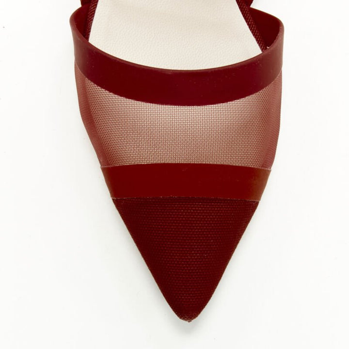 Female mannequin wearing Fendi Colibri Red Fabric Women Flats in Size EU36.5 | Available at JHROP