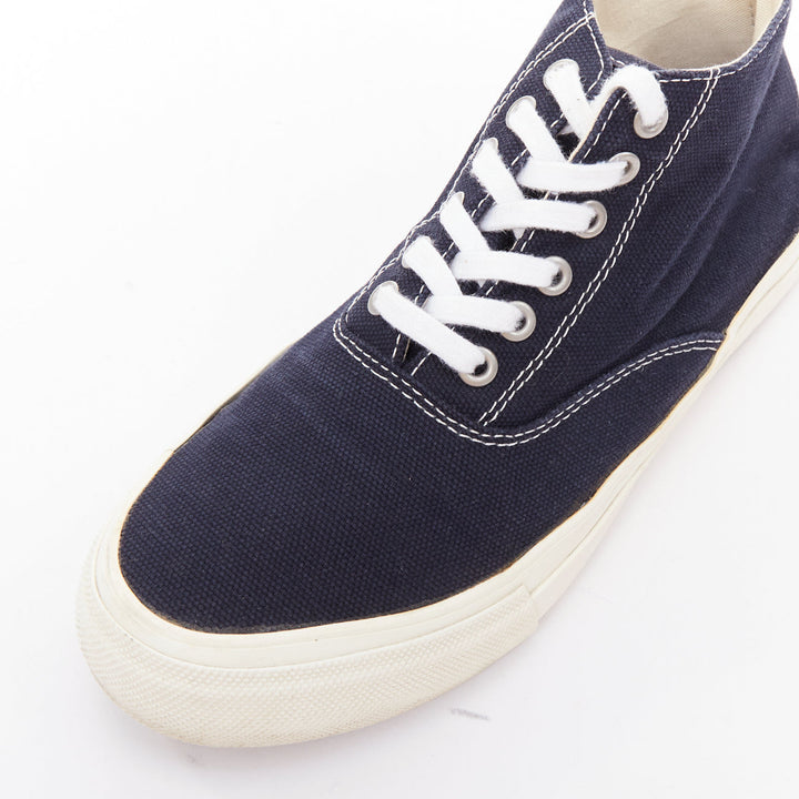 COMME DES GARCONS Homme navy canvas mid top skate sneakers EU39