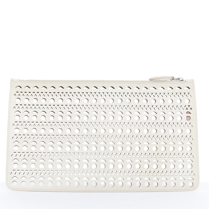 ALAIA Vienne laser cut tan beige neutral calfskin flat zip pouch clutch bag