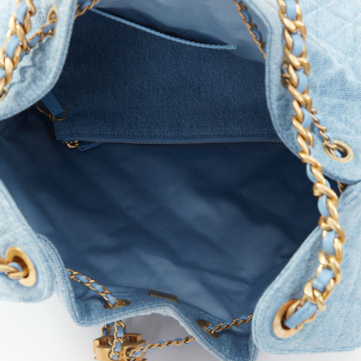 CHANEL Runway 25 Small light blue washed denim gold hardware bucket hobo bag