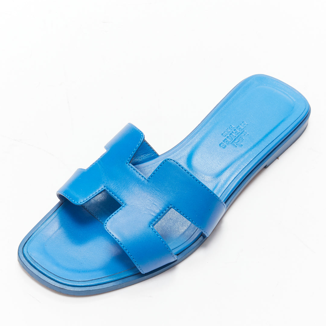 HERMES Oran cobalt blue smooth leather H flat sandals EU37.5