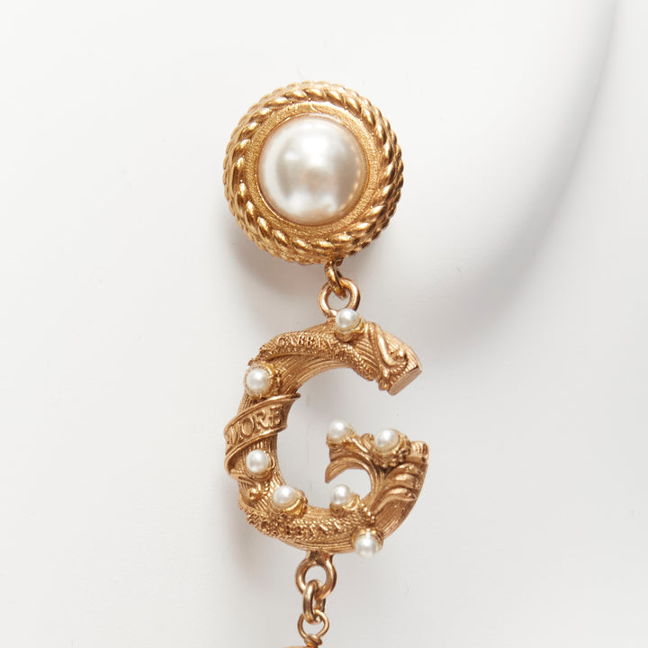 rare DOLCE GABBANA gold tone DG logo baroque pearl tiered drop clip earrings