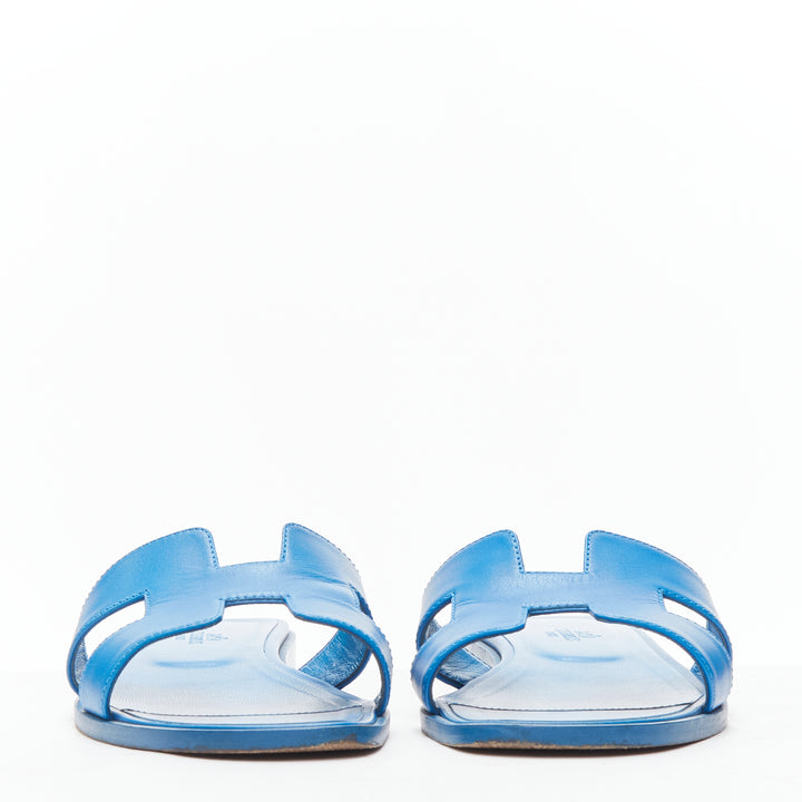 HERMES Oran cobalt blue smooth leather H flat sandals EU37.5