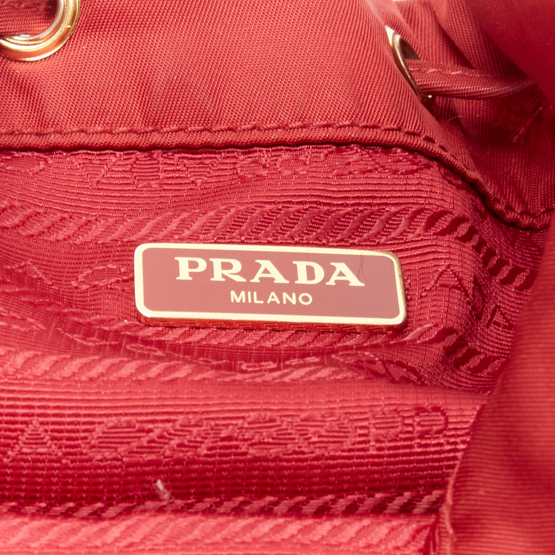 PRADA red nylon gold triangle plate drawstring bucket crossbody shoulder bag