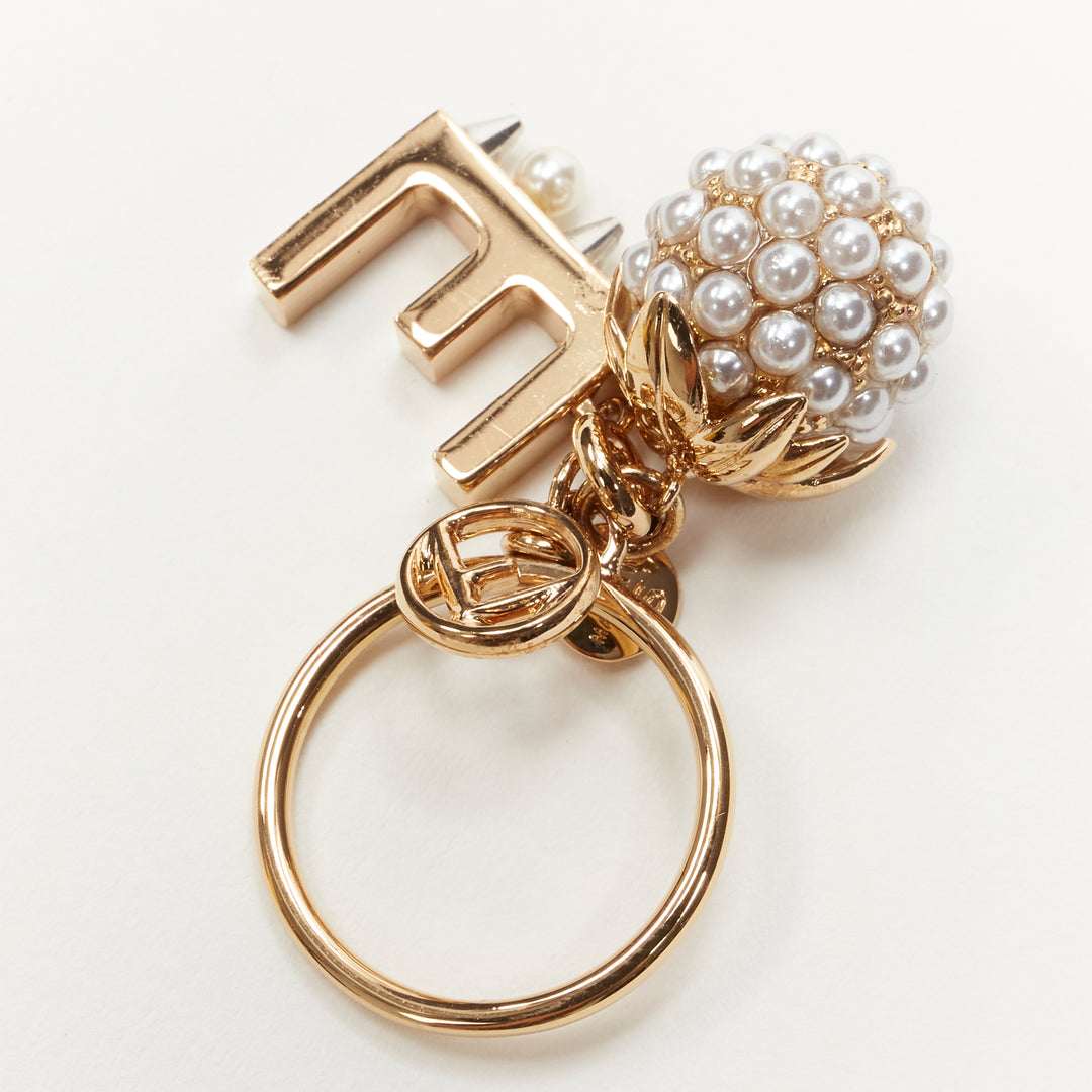 FENDI gold tone E alphabet pearl spike embellished berry charm ring