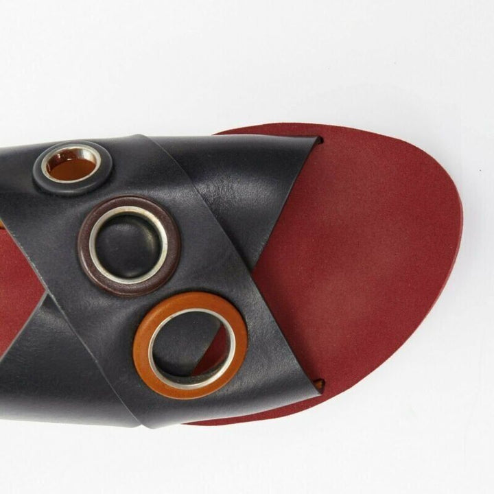 CHLOE black cross strap leather trimmed large grommet red rubber slides EU37
