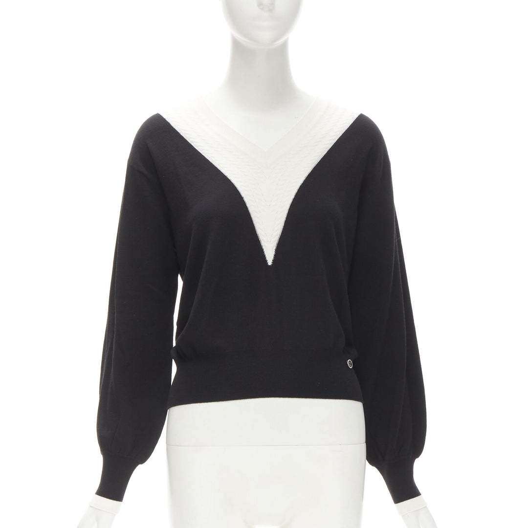 Authentic Chanel Black Solid Wool Top on sale at JHROP. Luxury Designer  Consignment Resale @jhrop_official